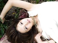 Hot And Sexy Brunette Chick From Japan Yura Aikawa Is Sexily Posing Outdoors Under The Tree