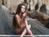 Tiny Naked Body Of Beautiful Silvie Deluxe Looks Hot And Tender On The Grey Rocks