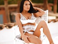 Lucy Evans Shooting in Sexy White Lingerie