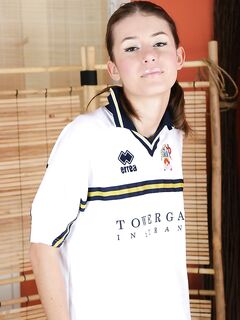 Skinny Soccer Fan Olivia In Striped Socks And Black Panties Removes Her T-shirt On The Floor photos (Olivia Onlytease)