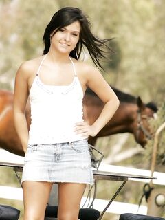 Sexy Brunette Doll Eden Petty In Jeans Skirt Makes A Strip Show By A Farm In The Country