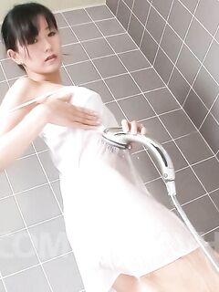 Japanese Cutie Manami Komukai Takes A Shower And Performs Oral Sex On Her New Friend