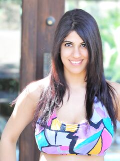 Playful Asian Girl Shows Ass In Tiny Shorts And Also Big Melons Taken Out Of Top photos (Kalila Kane)