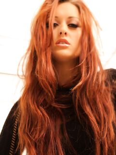 Photographic Art Becomes Exciting When Redhead Karlie Montana Enters The Scene To Pose In Lingerie.