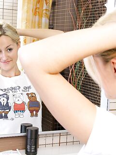 Joan Miller Gets Naked And The Showers Her Smooth Pussy In The Bathroom