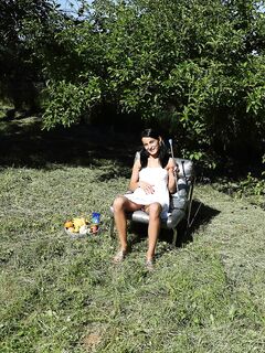 Charming Brunette Gal Lexie Dona Is In The Open Air Filling Pussy With Various Food