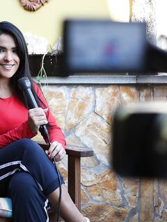 Busty Brunette Babe Valery Summer Has A Cam Shooting Her When She Plays With A Mic