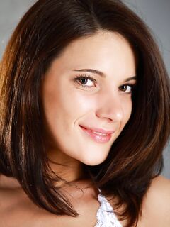 The Brunette Cutie Milla Yul Is Slowly Taking Off Her White Dress And Giving The Erotic Show