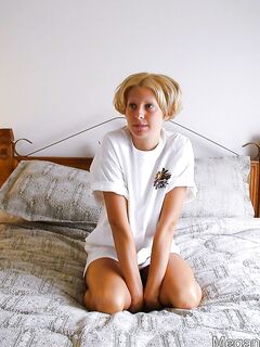 Bronzed Babe Megan Nubiles Looks Great Sitting Naked With The Big Guitar